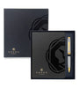 Cross brand gift set featuring a black leather notebook and matching black box with gold logo, alongside a silver and gold pen in a black tray.